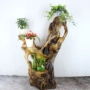 Toon gỗ nanmu gỗ hoa đứng một gốc khắc hoa cây cảnh kệ tự nhiên cổ cơ sở trang trí cửa hàng - Các món ăn khao khát gốc bộ bàn ghế gốc cây nhãn