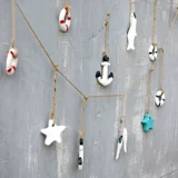 Средиземноморская стиль маленькая подвесная рыбацкая сетка с струйной гостиной фоновая стена стена стена декоративный декоративный кольцо