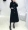 Chống mùa giải phóng mặt bằng áo khoác mỏng áo mùa thu màu đen và mùa đông quần áo mới giảm béo dài Hàn Quốc phiên bản của over-knee coat phụ nữ ao khoac