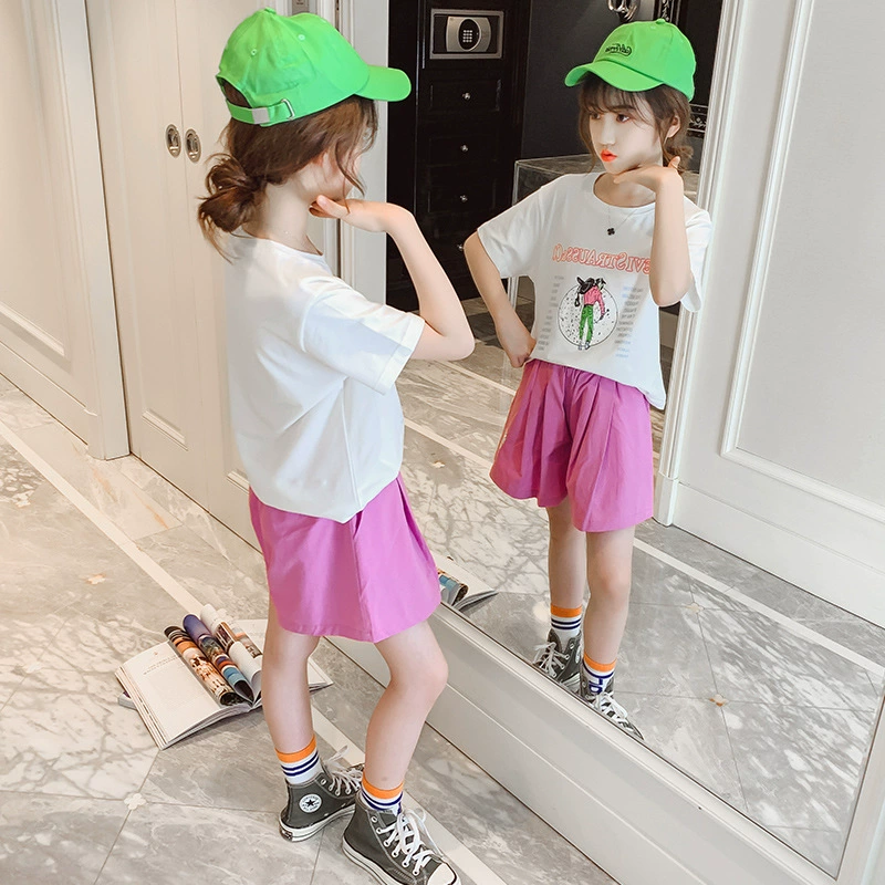 Quần áo trẻ em mùa hè 2020 Phong cách phương tây trẻ em Hàn Quốc in chữ hoạt hình ngắn tay + quần sooc quần culottes đồng màu - Khác