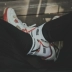 UZIS aj4 đen đỏ được lai với vớ xi măng trắng nam và giày nữ dày khăn dưới đáy ống dài bóng rổ vớ thể thao - Vớ thể thao