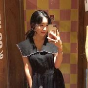 [Muzly] Hàn Quốc ins dark đen tương phản màu gỗ tai big ve áo eo dài không tay áo nữ