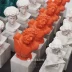 Điêu khắc mini Hy Lạp 19 Màu cam san hô Trang trí nhựa màu Xiaowei Apollo Statuette Đạo cụ - Trang trí nội thất