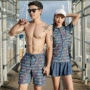 Cặp đôi đồ bơi phù hợp với kỳ nghỉ bên bờ biển Hàn Quốc chia váy spa bảo thủ che bụng mảnh mai áo tắm nam quần đi biển - Vài đồ bơi đồ đi biển cho cặp đôi