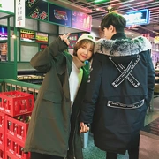 Quần áo mùa đông 2018 Quần áo cotton nam phiên bản Hàn Quốc của phần dài trên đầu gối dày bím tóc lông lớn cổ áo cotton nam và đồng phục nữ