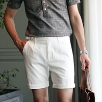 Mùa hè thường quần short trắng Người Anh thoải mái thời trang hoang dã yếm nam của Hàn Quốc thiết kế quần short trẻ quần bò nam đẹp