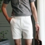 Mùa hè thường quần short trắng Người Anh thoải mái thời trang hoang dã yếm nam của Hàn Quốc thiết kế quần short trẻ quần bò nam đẹp