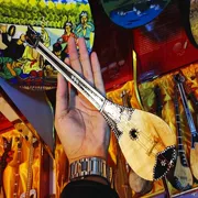 Nhạc cụ nhỏ lạ Tân Cương nhạc cụ thủ công Dongbula nhạc cụ đệm giá đặc trưng quốc gia - Nhạc cụ dân tộc