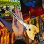 Nhạc cụ nhỏ lạ Tân Cương nhạc cụ thủ công Dongbula nhạc cụ đệm giá đặc trưng quốc gia - Nhạc cụ dân tộc mua cổ cầm