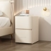 Bàn nhỏ đầu giường nhỏ đơn giản hiện đại màu kem sang trọng nhẹ sàn gỗ đặc cực hẹp miễn phí lắp đặt tủ đựng đồ bằng da Buồng