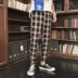 Phong cách Hồng Kông đôi lỏng lẻo kẻ sọc thể thao quần âu nam xu hướng Hàn Quốc sinh viên chân nhỏ hoang dã Quần dài Harlan - Quần mỏng Quần mỏng