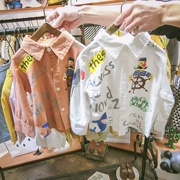 Trẻ em mặc 2019 xuân hè mới cho trẻ em áo sơ mi dài tay bằng vải lanh cho bé phiên bản Hàn Quốc của phần dài của áo sơ mi bé trai - Áo sơ mi