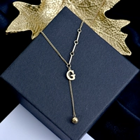 Золотое ожерелье с кисточками
