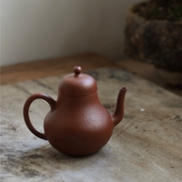 Yixing ấm trà thiết lập trà boutique handmade nhỏ gian hàng 100cc lỗ duy nhất lê da Zhu Mu đồ đất nung