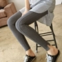 Quần legging mùa đông nữ mặc màu đen cộng với nhung khâu quần dài bằng vải cotton cao đến eo dày bó sát chân mua quần áo