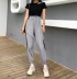Dora Chaoren Hall Hong Kong hương vị retro chic máy cẩn thận bị rò rỉ vai ngắn tay T-Shirt + đàn hồi eo quần âu phù hợp với nữ Bộ đồ
